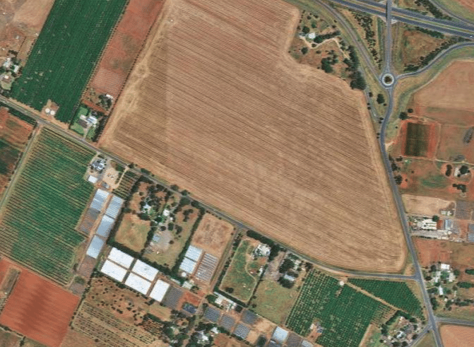 Aerial of land for a future 245 lot residential subdivision within Munno Para Downs, SA