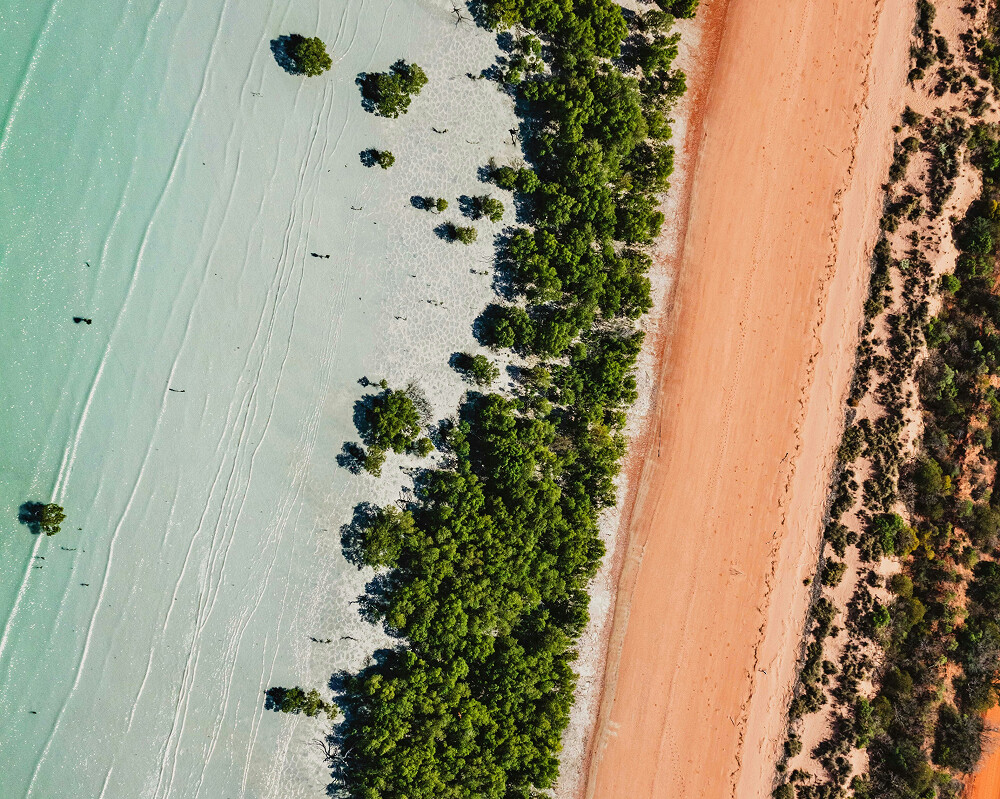 An aerial across a beach in Australia