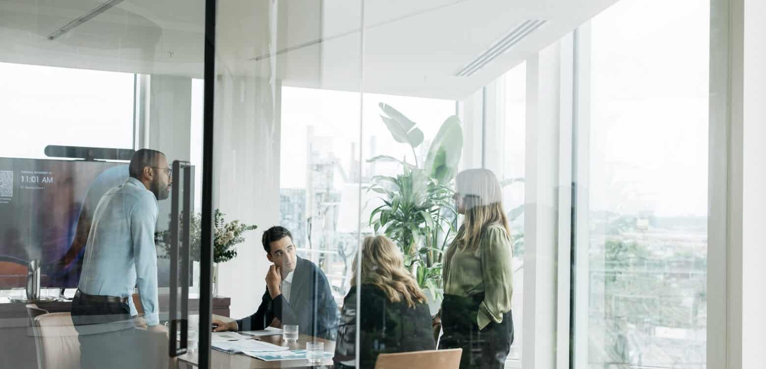 Staff discussion at Ark Capital